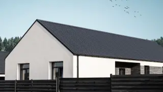 Nowoczesny dom z ciemnym dachem z blachy. Sprawdź blach na dach ceny i wybierz najlepsze rozwiązanie dla swojego domu.
